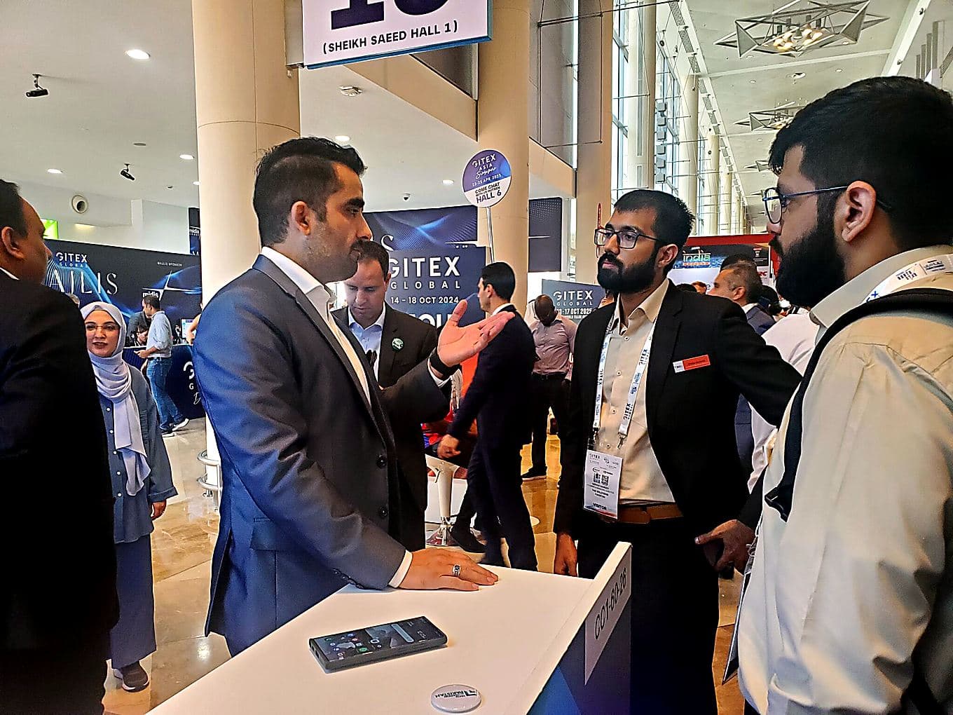 Meeting a delegate in the exhibition hall at GITEX Global